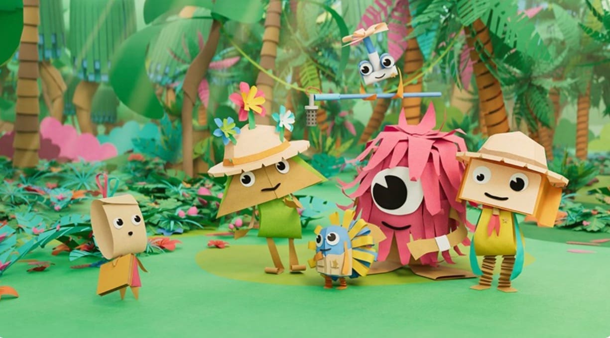 animated characters crafted out of paper gather together in a woodland setting to have fun