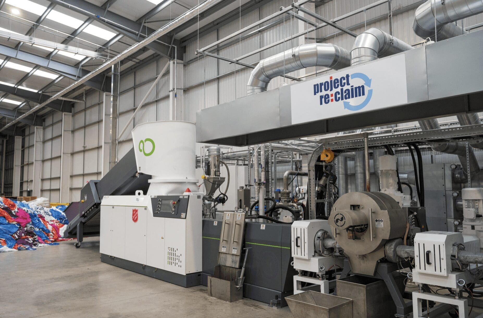 The UK's first post-consumer polyester recycling machine.
