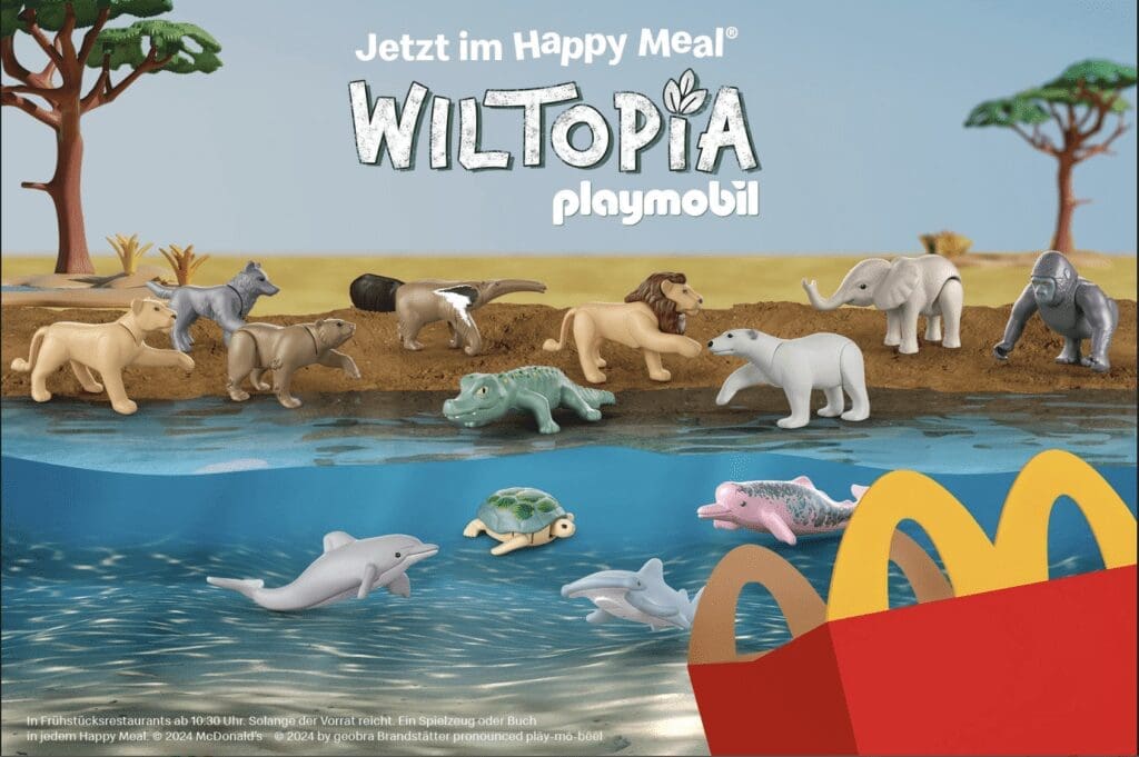 a safari and ocean setting with Playmobil animal figures roaming the landscape