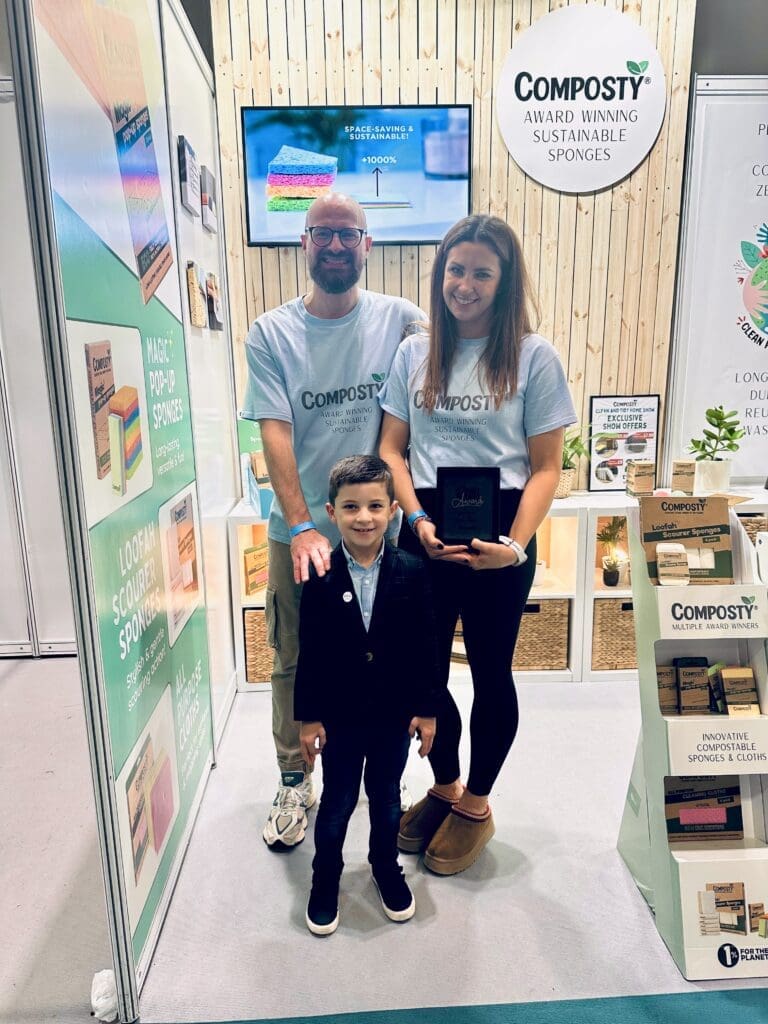 Spencer Willis poses with Composty founders on their stand