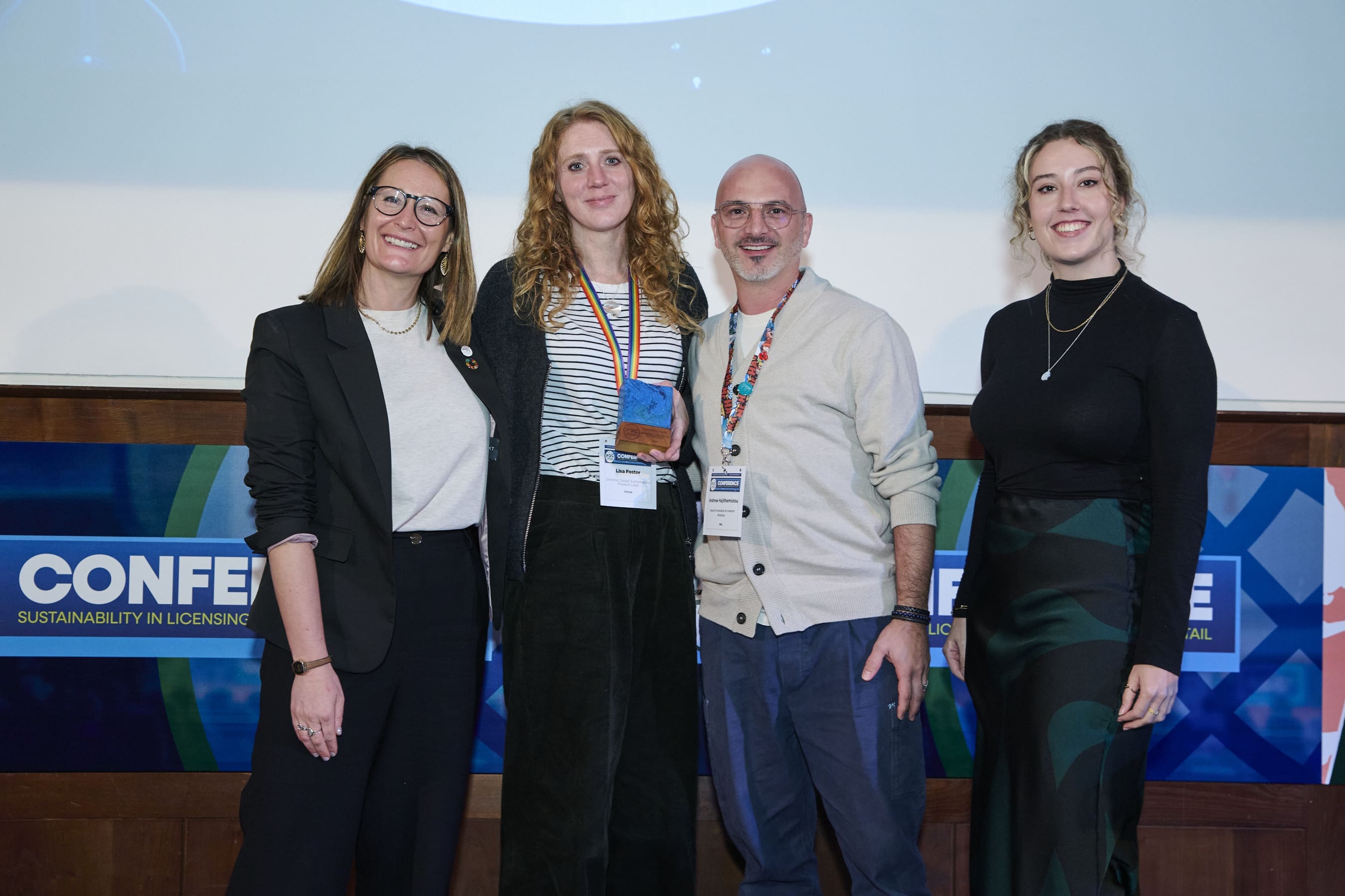 Lisa Foster and Andrew Hajithemistou and the team at The Marketing Store (tms) receiving their award.