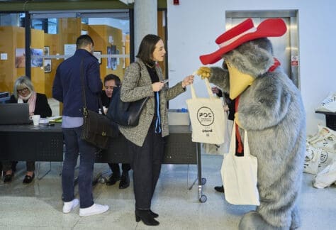 The Wombles helping to welcome POCC attendees