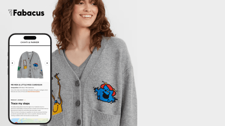 A woman wearing a grey cardigan with Mr Men characters on it. A phone screen displays the DPP information.