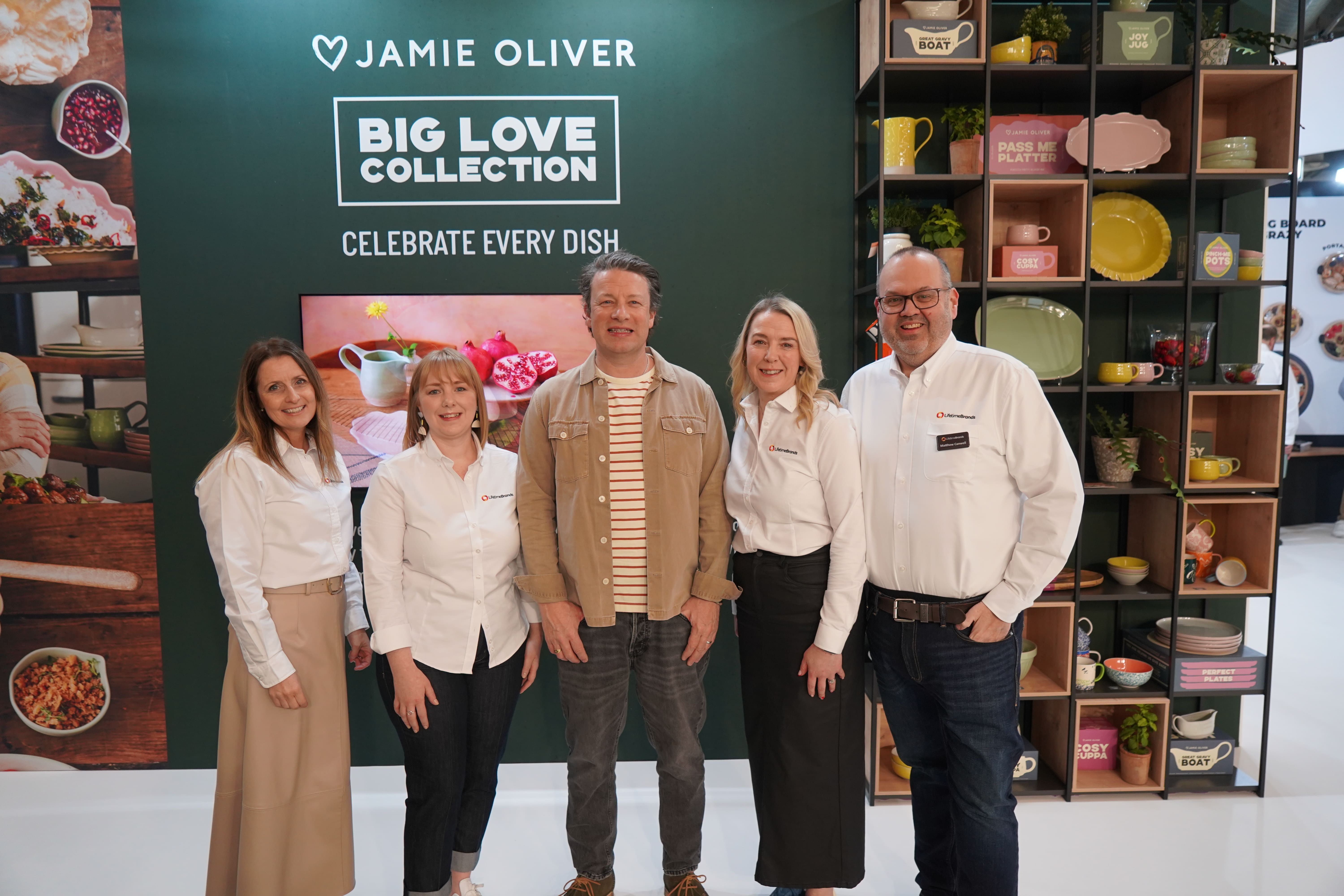 Jamie Oliver standing with four other people