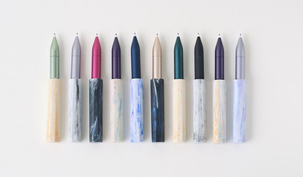 Tom's Studio recycled plastic pen lids.