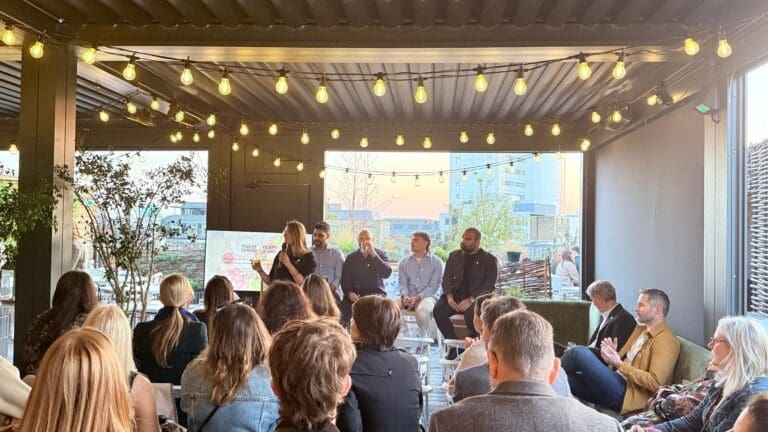 A panel sitting in front of an audience