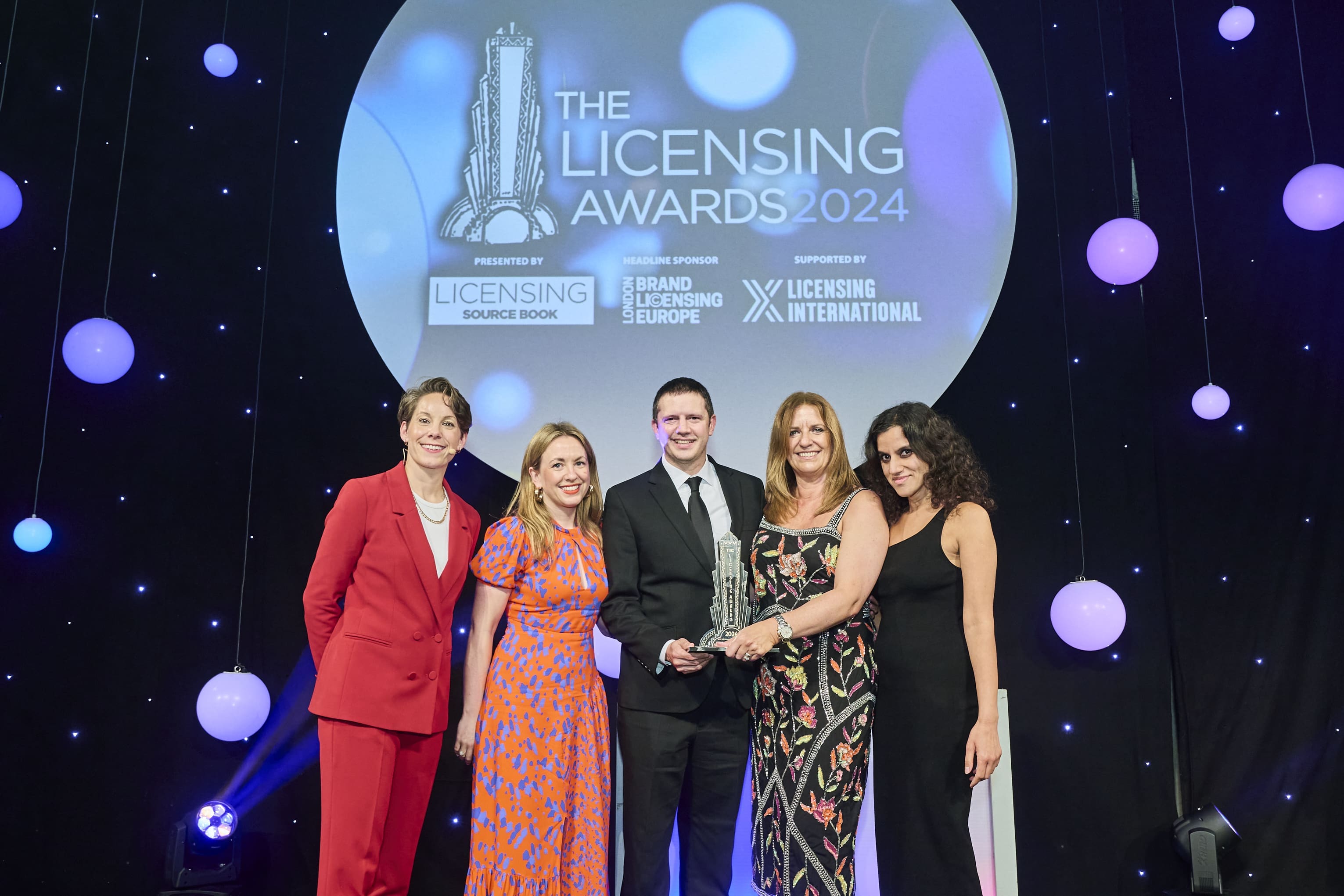 Fabacus and Nobody's Child team winning award.