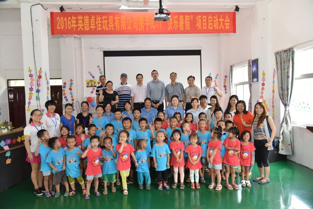 A group of children standing together facing the camera